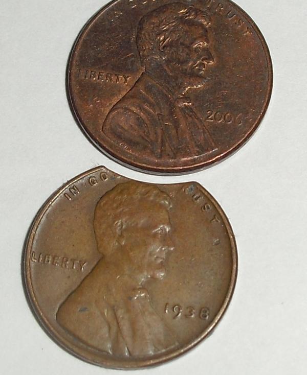 Help-With-Two-Pennies;-Both-Cut,-One-With-No-Reverse..?
